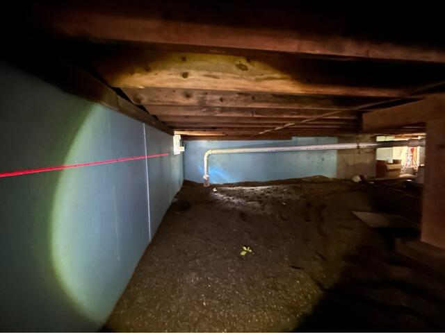 Damp, Musty Crawl Space Encapsulation in Northport, Maine - Before Photo