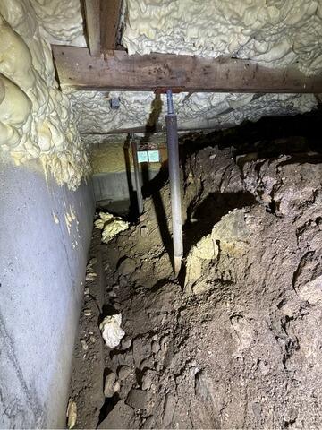 Installing a Vapor Barrier in a Camden, Maine Crawl Space - Before Photo