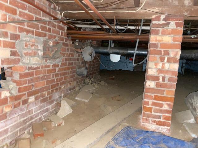 Installing CleanSpace Vapor Barrier in Kennebunkport, Maine Crawl Space