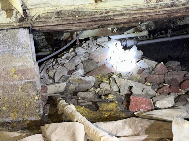 Installing a Crawl Space Vapor Barrier in Bath, Maine - Before Photo