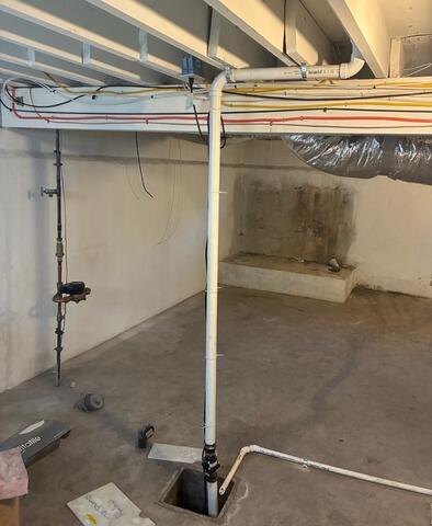 Replacing Old Sump Pump in Bangor, Maine - Before Photo