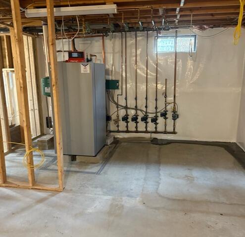 Basement Wall Vapor Barrier Installation in Scarborough, Maine - After Photo