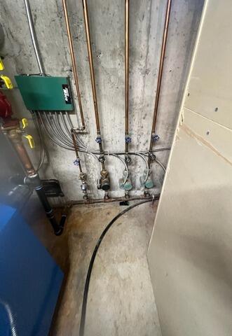 Basement Wall Vapor Barrier Installation in Scarborough, Maine - Before Photo