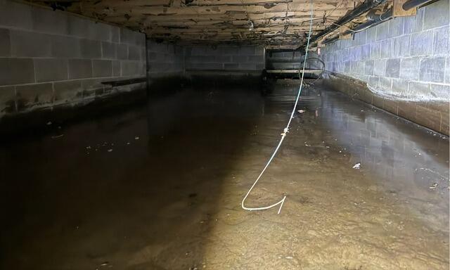 Flooded Crawl Space Encapsulation in Wells, Maine - Before Photo