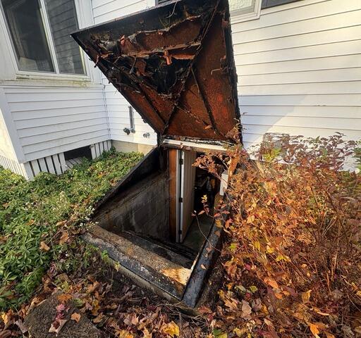 Rusty Bulkhead Door Replacement in Portland, Maine - Before Photo