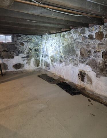 Repairing a Bowing Foundation Wall in Calais, Maine - Before Photo
