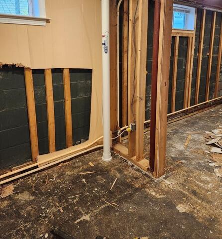 Interior Basement Drainage Installed in Dover, NH - Before Photo