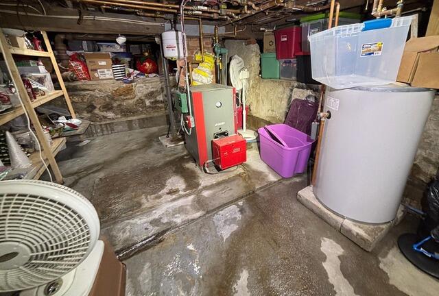 Waterproofing Wet Basement with New Concrete Floors in Brunswick, Maine - Before Photo