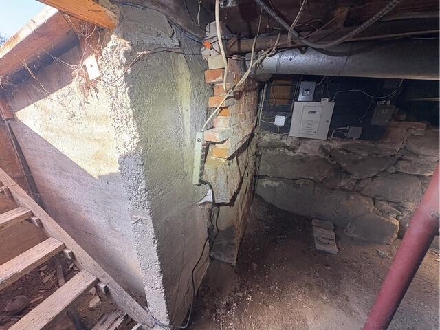 Bowing Wall Repair in Mechanic Falls, Maine - Before Photo