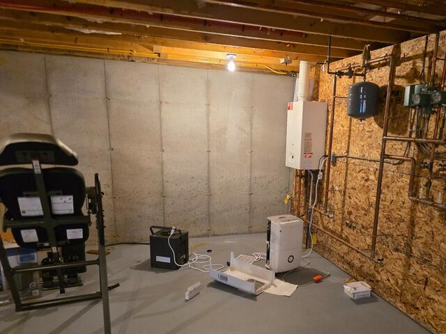 Augusta, Maine Basement Waterproofing Installation - Before Photo