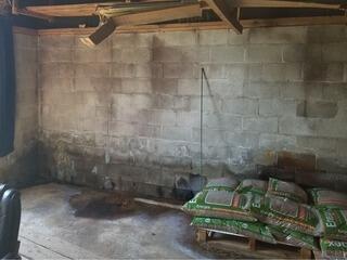 Cinder Block Wall Seeping Water in East Millinocket