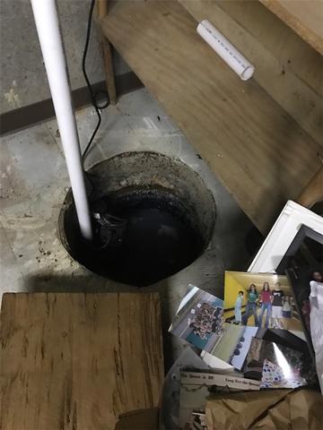 Old, Inefficient Sump Pump Replaced In Matthews, MO - Before Photo