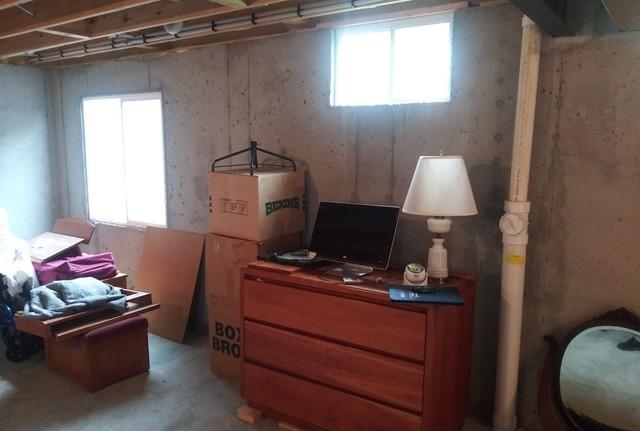 Insulating a Basement in Saint Paul, MO - Before Photo