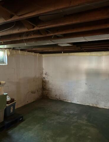 Waterproofed Basement in Champaign, IL - Before Photo