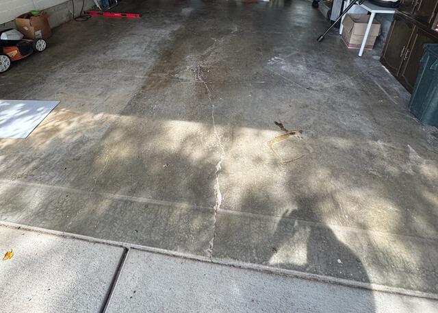A Saint Louis Home Garage Concrete Repair - Before Photo