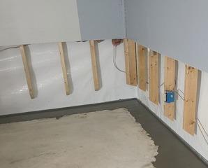 Water Damaging Basement Walls in Barnhart, MO Eliminated with Wall and Drainage Systems