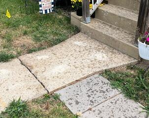 Making an Uneven Sidewalk Level Again in Saint Ann, MO
