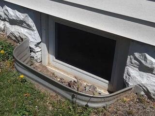 Replacing a Basement Window Well in Greenville, IL