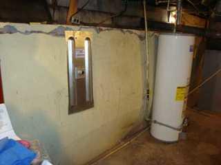 Interior Step Foundation Wall Bowing in Murphsboro, IL