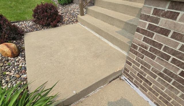 Sinking Concrete Steps Lifted in Rochester, MN - Before Photo