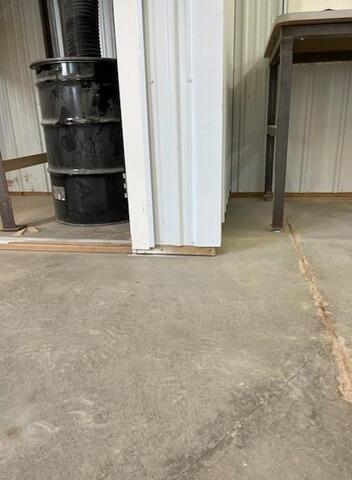 Settling Concrete Floor Lifted in Anoka, MN