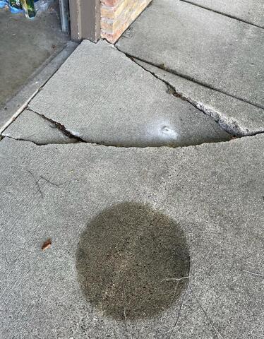 Severely Sunken Driveway Lifted in Wacouia, MN - Before Photo