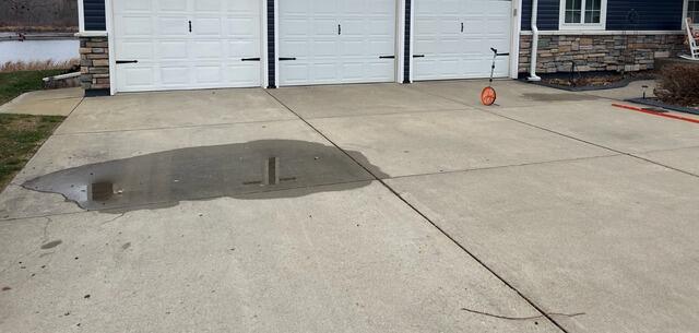 Uneven Driveways Lifted with PolyLevel in Warsaw, MN - Before Photo