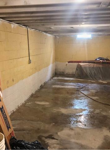 Damp Basement Gets Waterproofed in Waseca, MN - Before Photo