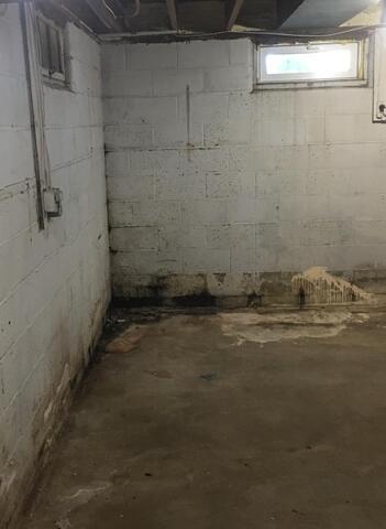 Leaky Basement Repaired in Elma, IA - Before Photo