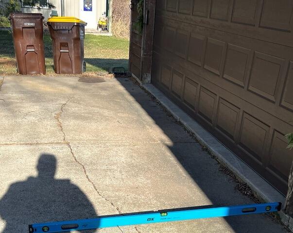 Sinking Driveway Lifted with PolyLevel in Webster, MN