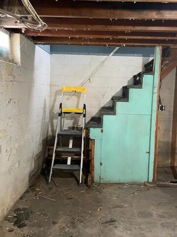 Clarkfield, MN, Wet Basement Repaired - Before Photo