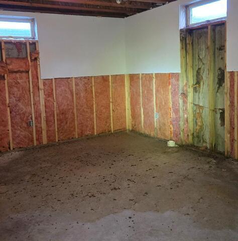 Cushing, WI, Wet Basement Fully Waterproofed - Before Photo