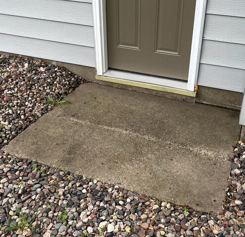 Sunken Concrete Gets Lifted with PolyLevel in Minneapolis, MN - Before Photo