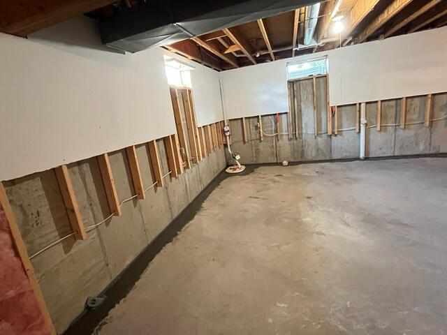 Basement Waterproofing System Installed in Cushing, WI - After Photo