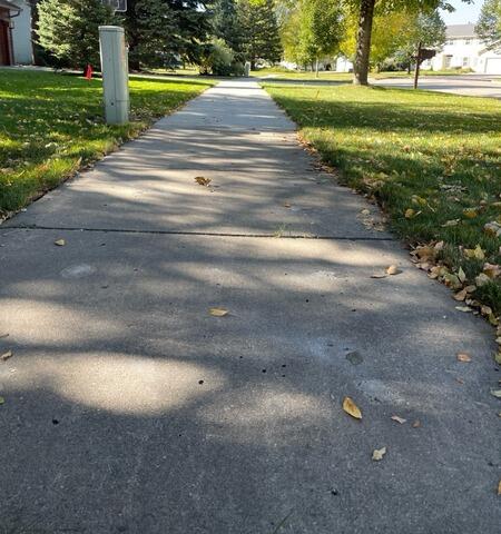 Uneven Concrete Sidewalk Leveled in Grand Forks, ND
