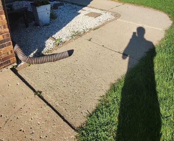 Sinking Walkway Lifted with PolyLevel in Jamestown, ND - Before Photo