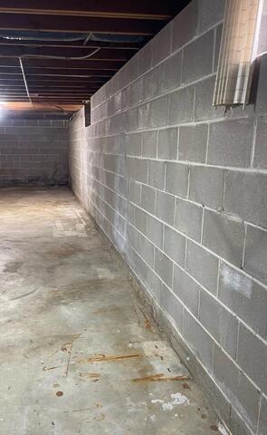 Leaky Basement Walls Waterproofed in Minneapolis, MN - Before Photo
