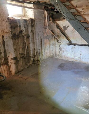 Wet Basement Waterproofing Installation in Arcadia, WI - Before Photo