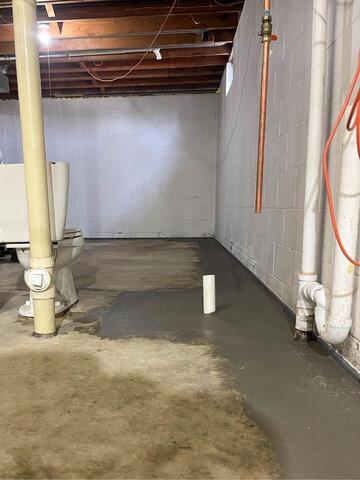 Leaking Basement Floor Waterproofed in Eyota, MN - After Photo