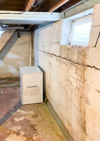 Bowing Wall Repair in Albert Lea, MN - Before Photo