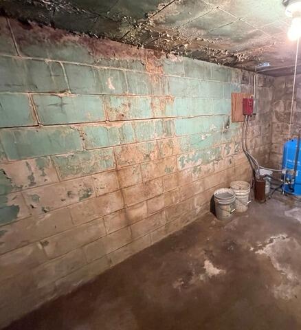 Bowing Wall Repair in Byron, MN - Before Photo