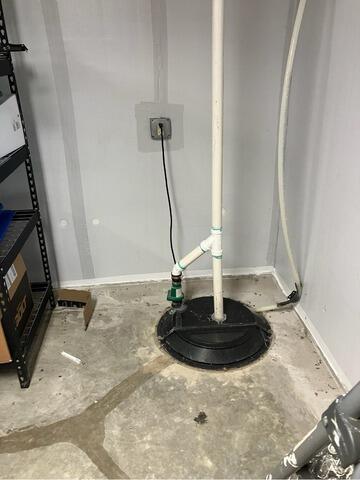 Bad Sump Pump Replaced in New Hampton, IA - Before Photo