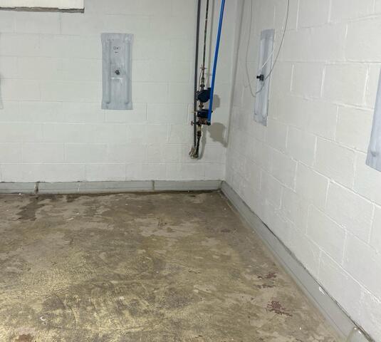 Water Damaged Basement Repaired in Garner, IA - Before Photo