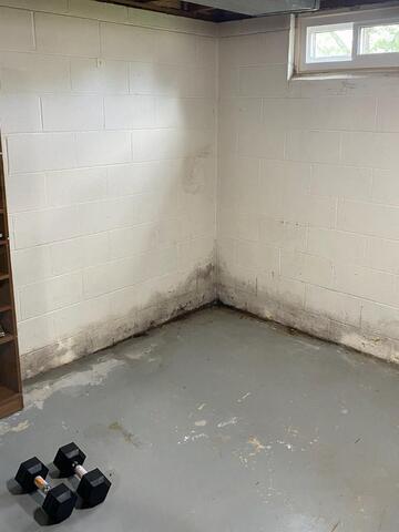 Mason City, IA, Basement Waterproofed & Repaired - Before Photo
