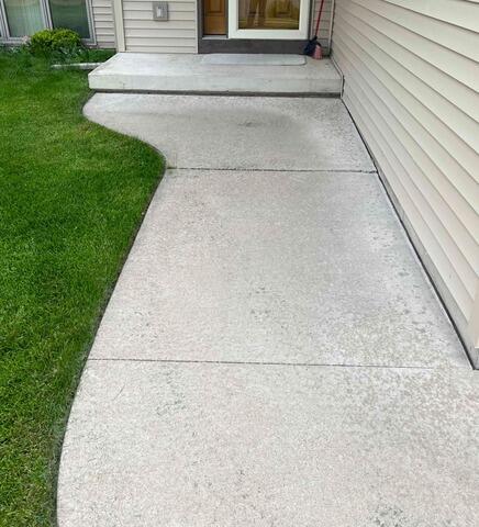 Sinking Slab Repair in Holmen, WI - Before Photo