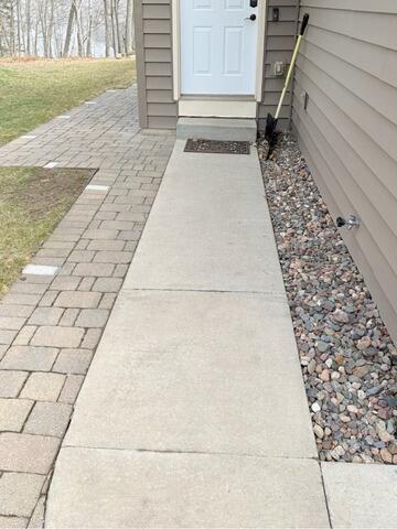 Concrete Sidewalk Repair in Holcombe, WI - Before Photo