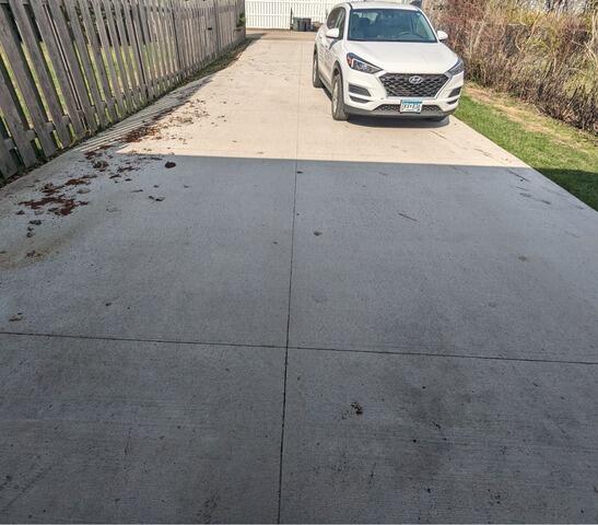 Concrete Driveway Lifted with PolyLevel in Grand Forks, ND - Before Photo