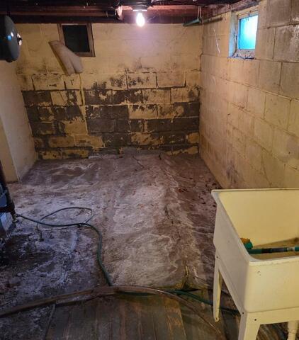 Waterproofing and Foundation Repair Completed in Lansford, ND - Before Photo
