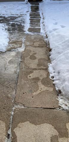 Moorhead, MN, Sinking Walkway Lifted - Before Photo