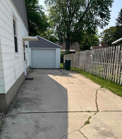 Sinking Driveway Repair in Austin, MN - Before Photo